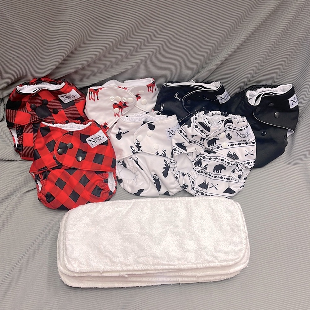 7 boy Nora’s Nursery cloth diapers with inserts